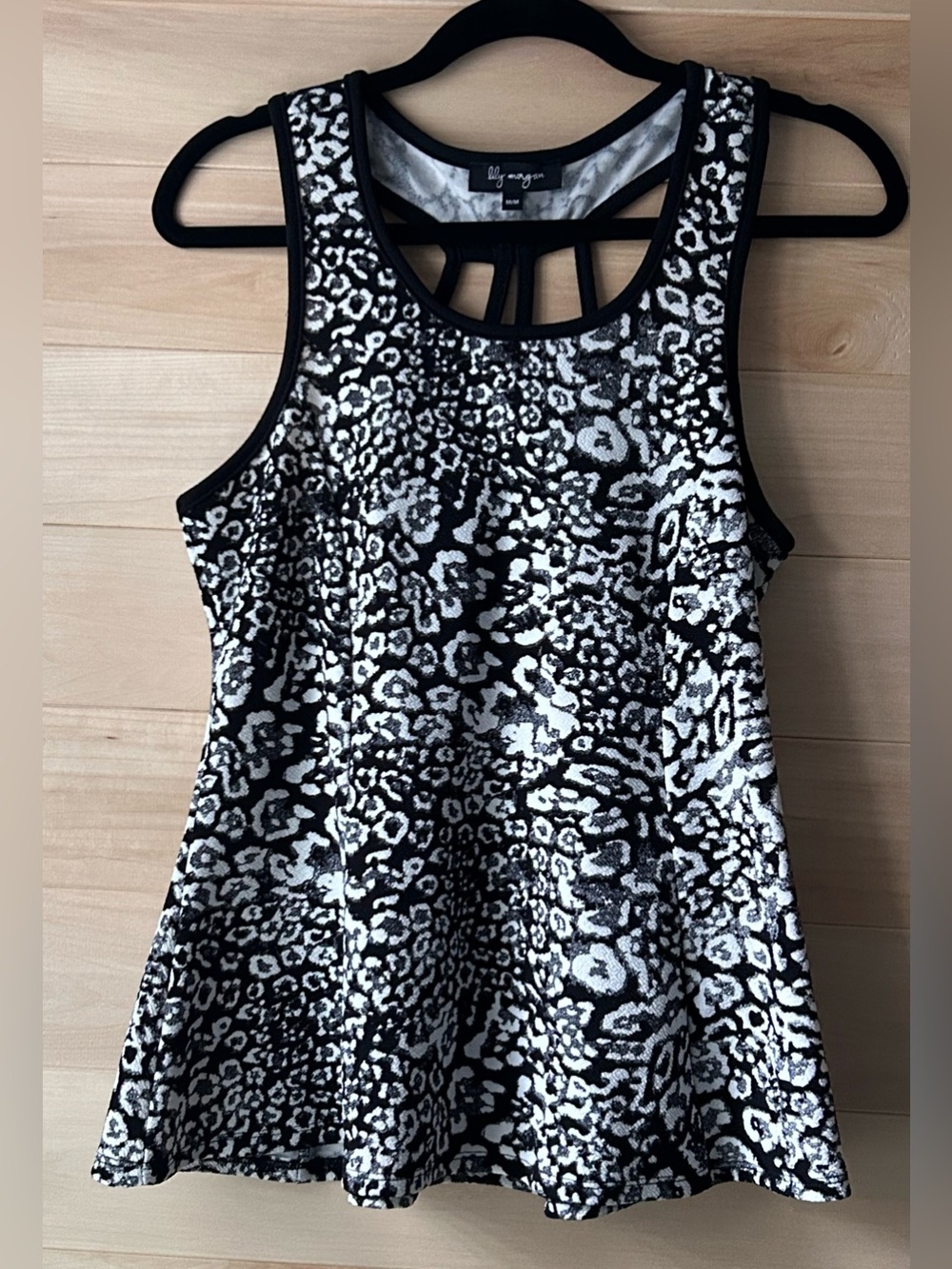 This Lily Morgan tank top Size Medium black white animal print racerback design